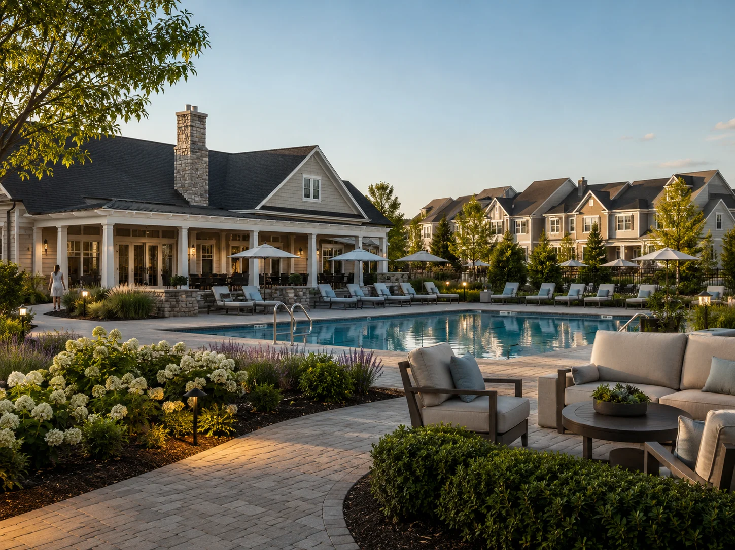 Clubhouse and outdoor pool in an amenity-rich Bucks County townhome community.