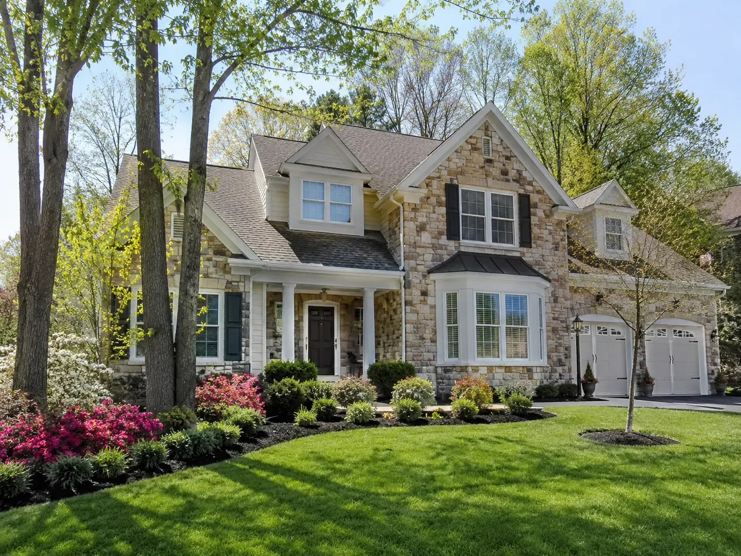 Stone-front home with landscaped yard in Chalfont PA