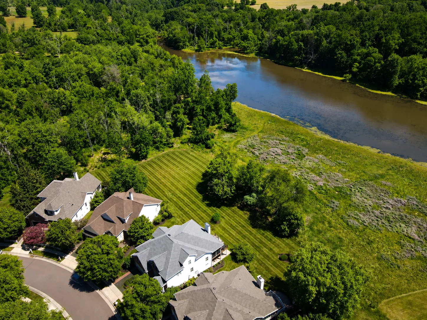 Aerial view of homes and pond in Lakeview Estates