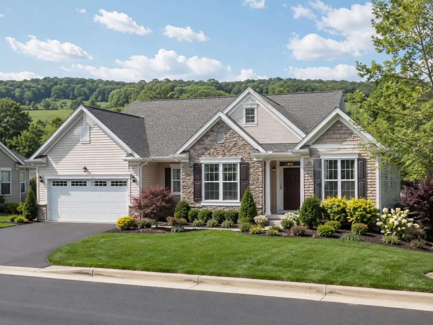 Single-family 55 plus home with stone exterior and landscaped yard in New Hope PA