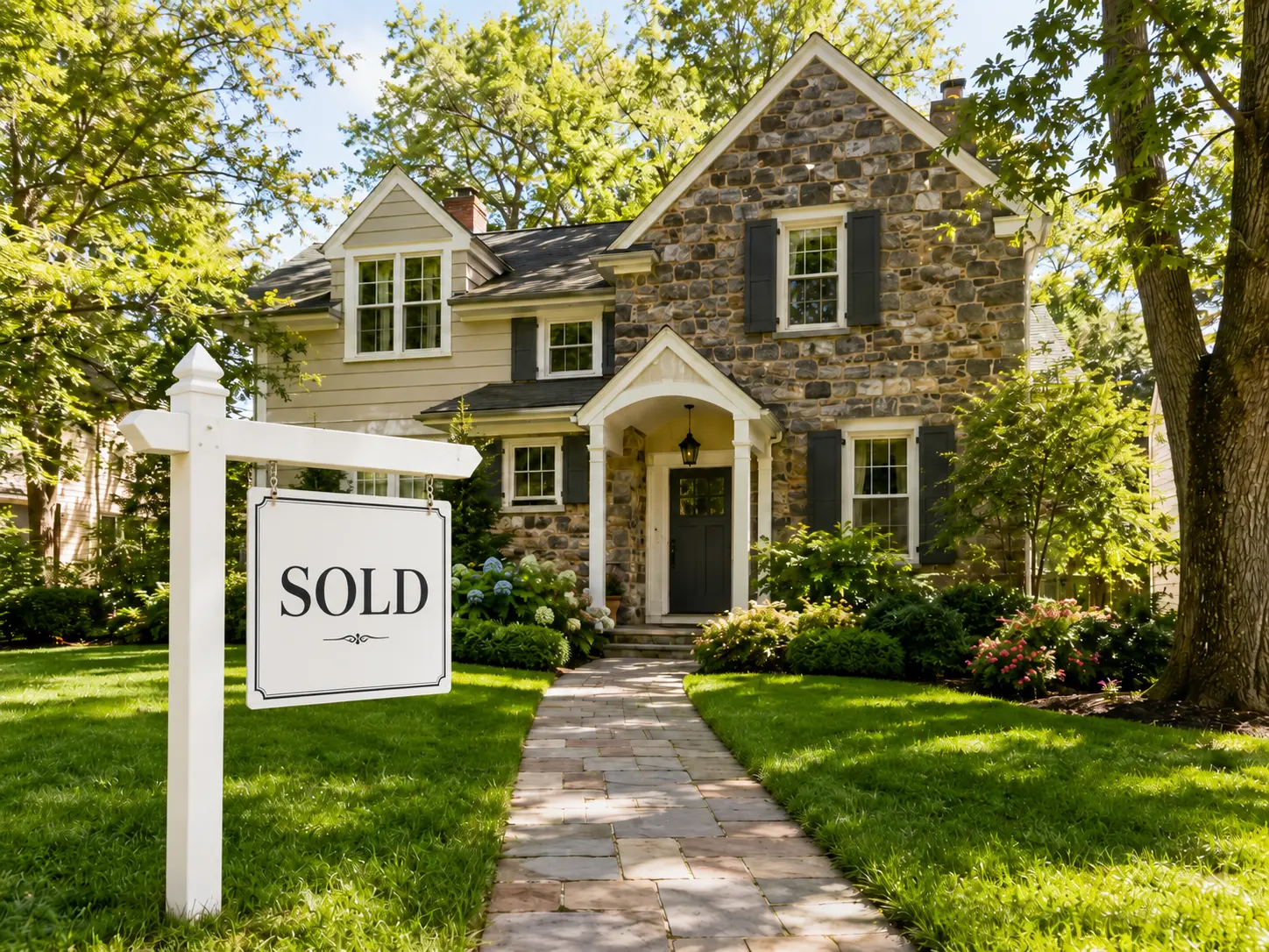 Sold home in New Hope PA with stone exterior, landscaped front yard, and real estate sold sign