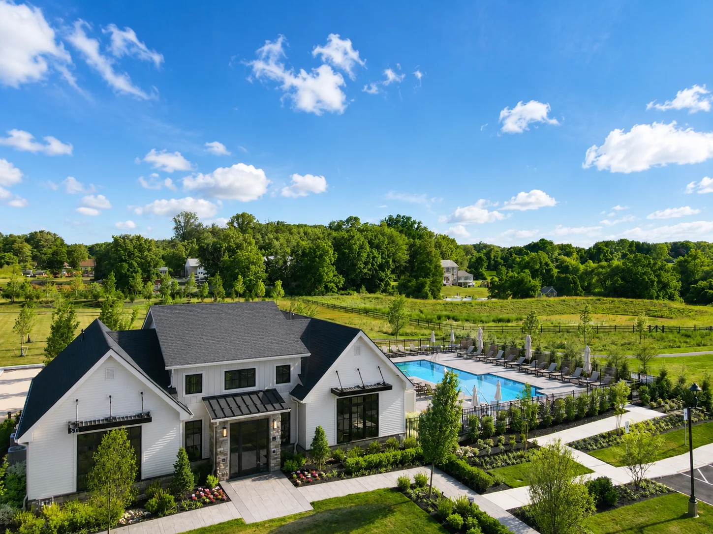 Clubhouse and outdoor pool at Regency at Stone Meadows Farm 55+ community