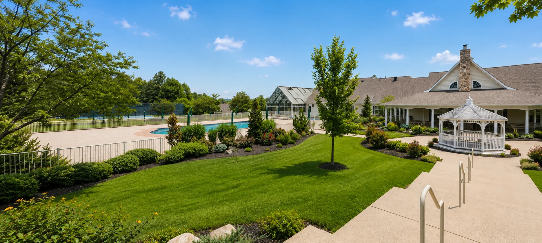 Clubhouse, pool and landscaped amenities at Traditions at Washington Crossing 55+ community