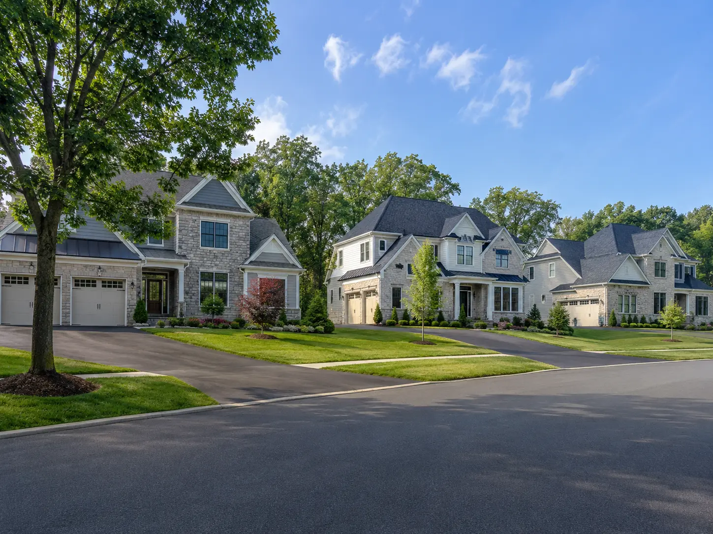 Upscale new construction homes in Upper Makefield Township with manicured lawns